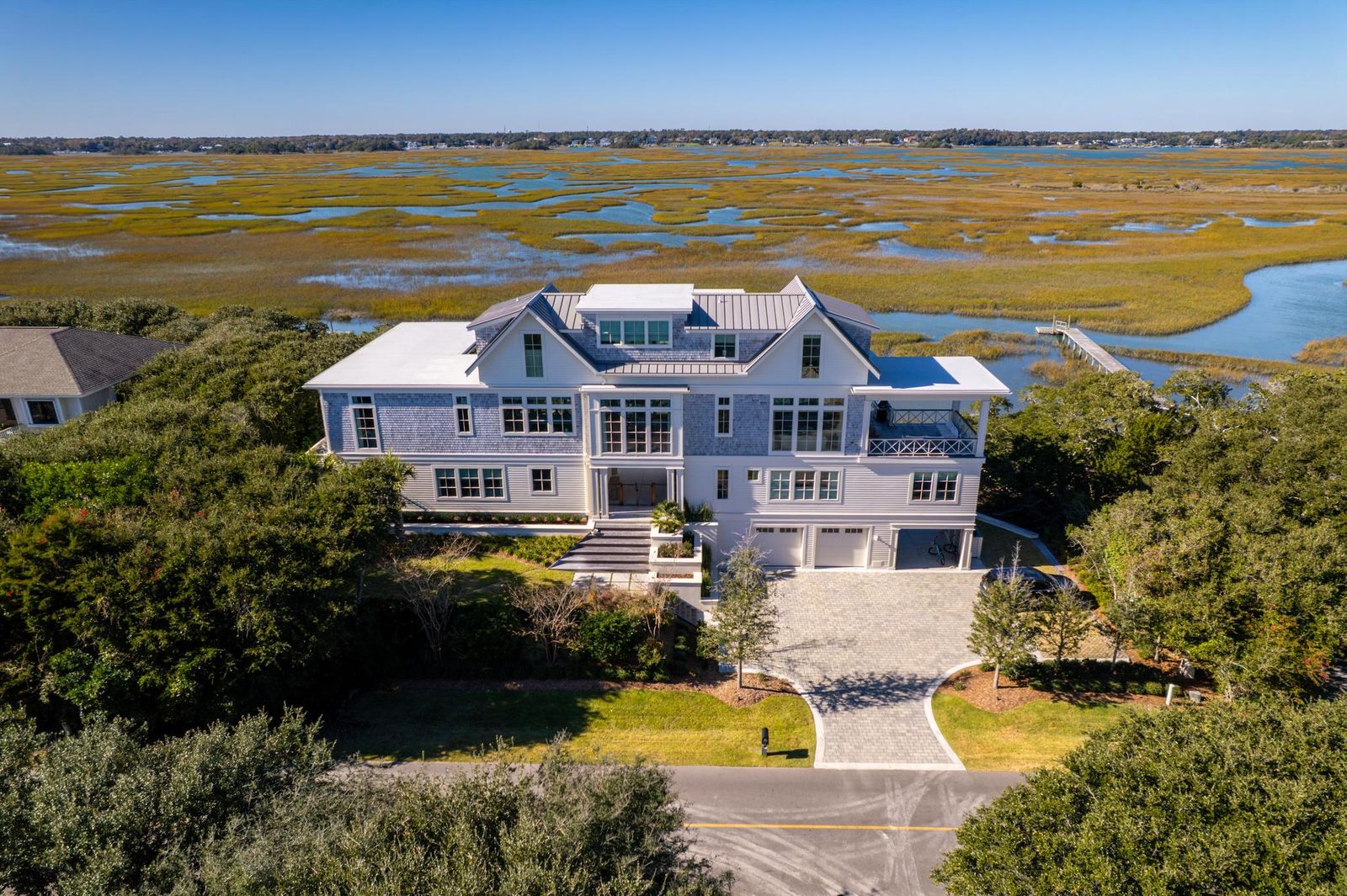 Rear elevation of the residence seen from the marsh
