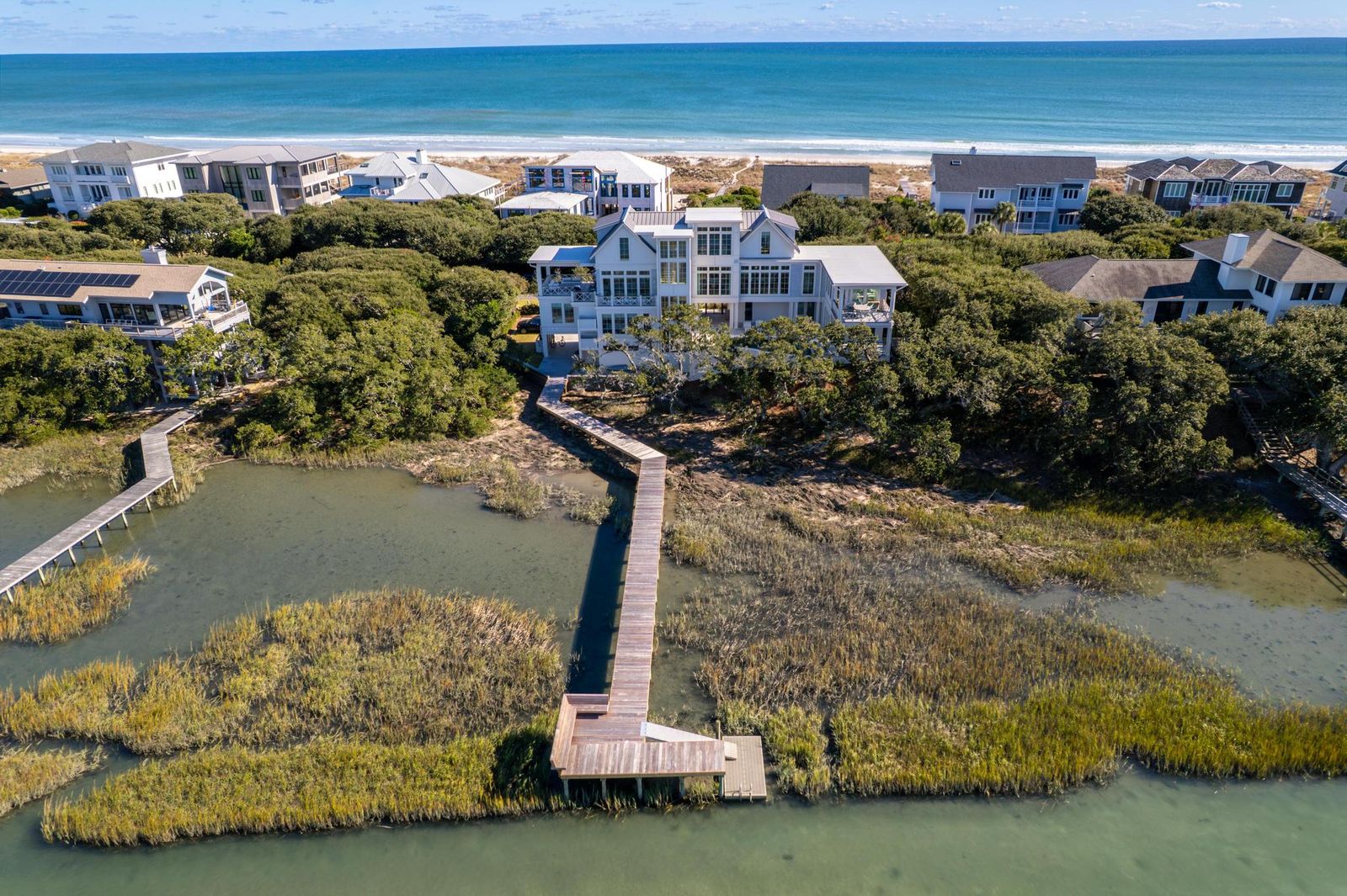 Aerial view of the boardwalk crossing the marsh to the private dock